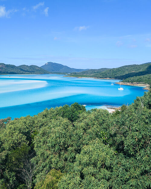View from Hill Inlet viewpoint of the blue waters surrounding Whitehaven Beach